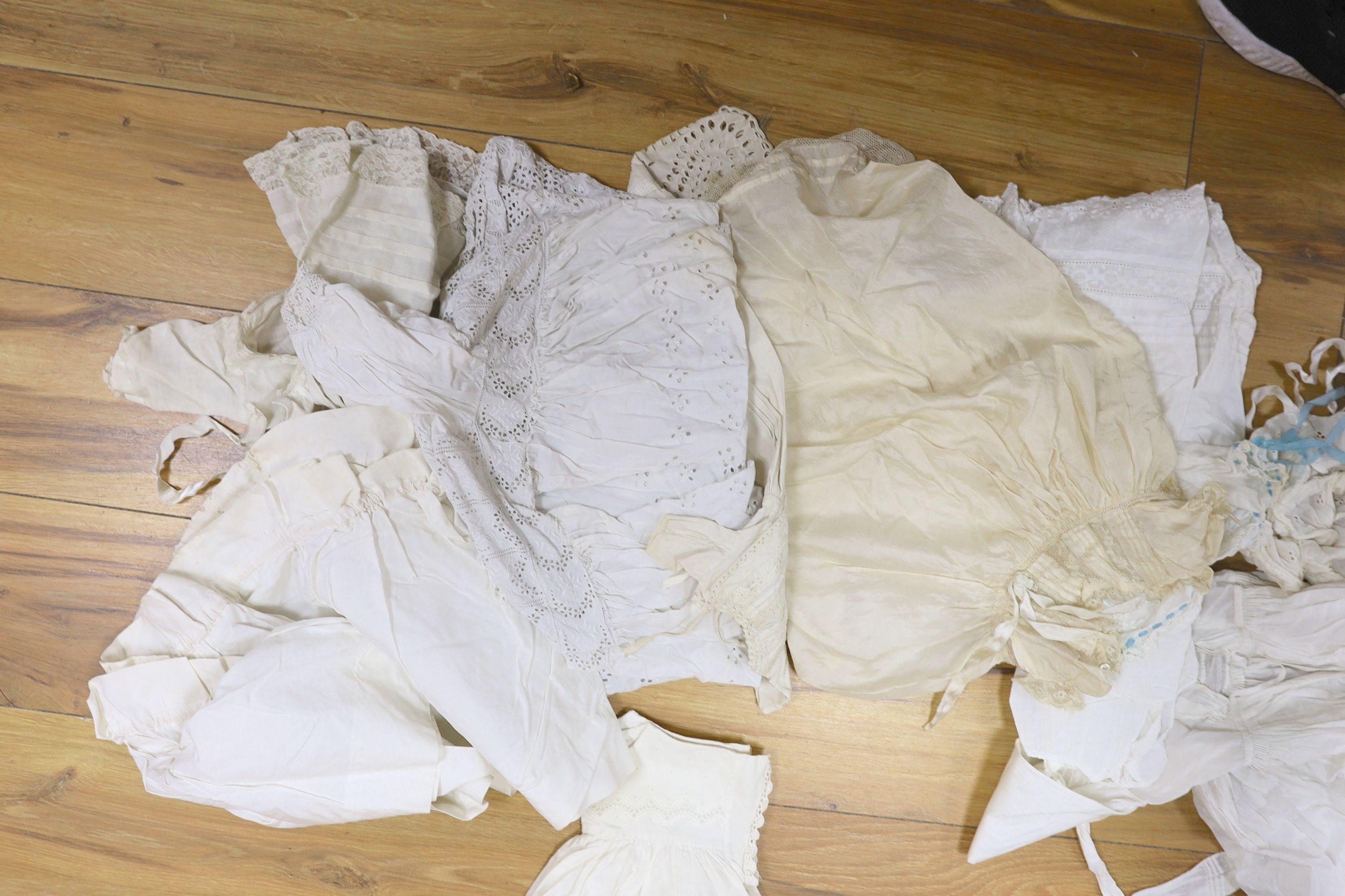 A collection of whiteworked baby gowns